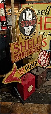 SHELL FROM THE PUMP ARROW IN WOOD. - click to enlarge
