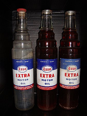 esso, three different esso extra bottles - click to enlarge