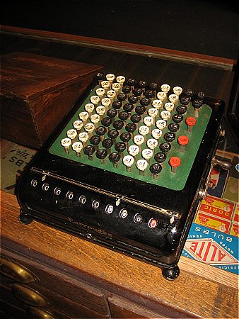 EARLY ADDING MACHINE - click to enlarge