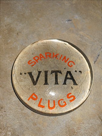 VITA PLUGS PAPERWEIGHT - click to enlarge