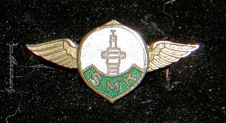 Enamel Badge. S.M.K. PLUGS - click to enlarge