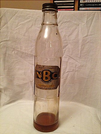 NBC motor oil bottle - click to enlarge