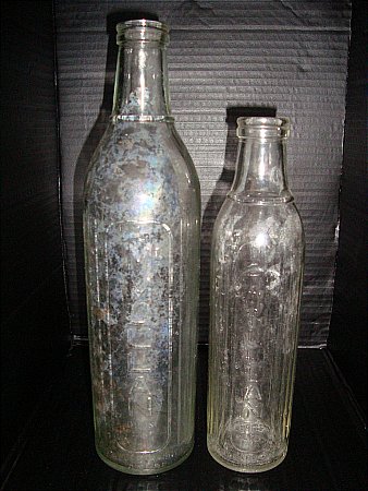 silensol oil bottles, company name of mcmullan down back of bottles - click to enlarge