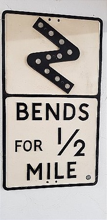 ROAD SIGN BENDS 1/2 MILE - click to enlarge