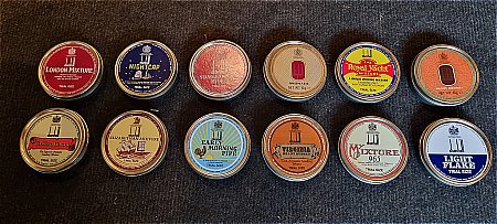 SET OF 12 TOBACCO TINS - click to enlarge